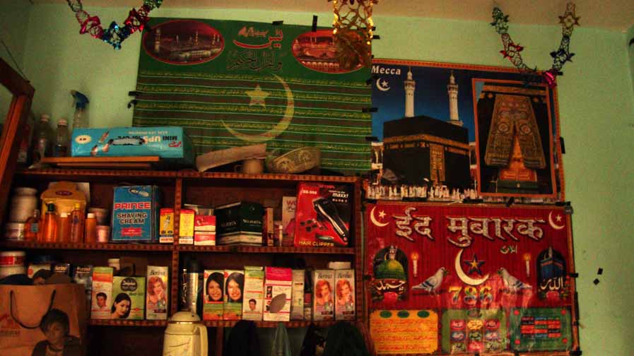 Barber shop main bazar, Leh, assortment of Islamic posters