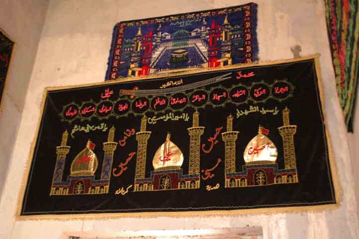 Alam, Three Holy Mosques, and a cloth banner of Kabah above it, Imambara Chuchot Yokma