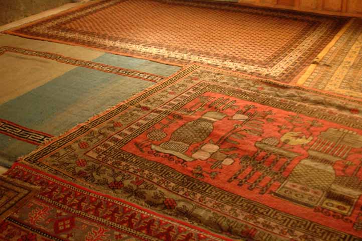Tibetan blue and white pile rug and an antique Yarkhandi carpet, Jama Masjid, Leh