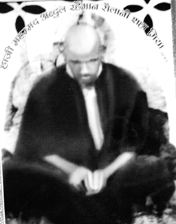 A black and white image of Sailani baba, often claimed to be an ‘original’ photograph of the saint.